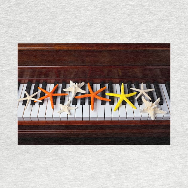 Starfish On Piano Keys by photogarry